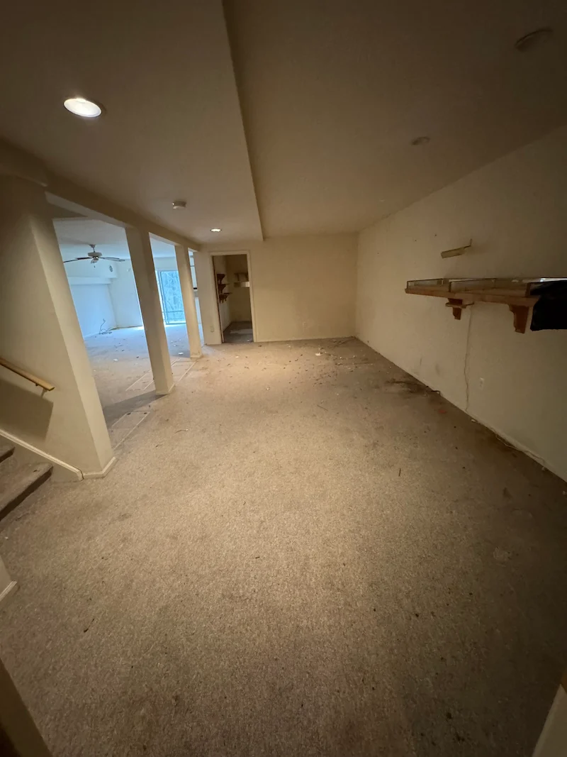 A completely cleared and open basement in Bloomfield, North Jersey after professional junk removal by JunkDoctors.