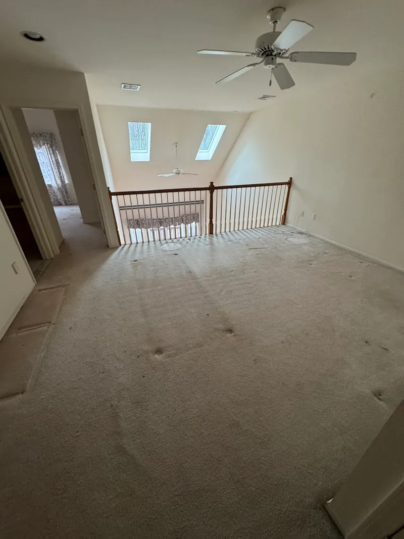 A fully cleared living room in Montvale, New Jersey after an estate cleanout by JunkDoctors.