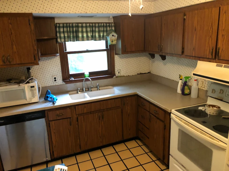 A Willingboro, New Jersey kitchen space completely cleared of severe hoarding debris, trash, and clutter, showing clean counters and floor after professional junk removal.