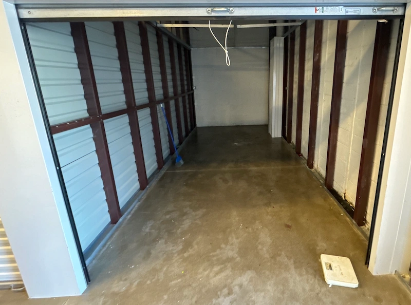 An empty rental storage unit in Woodbridge, New Jersey after JunkDoctors completed a full cleanout.